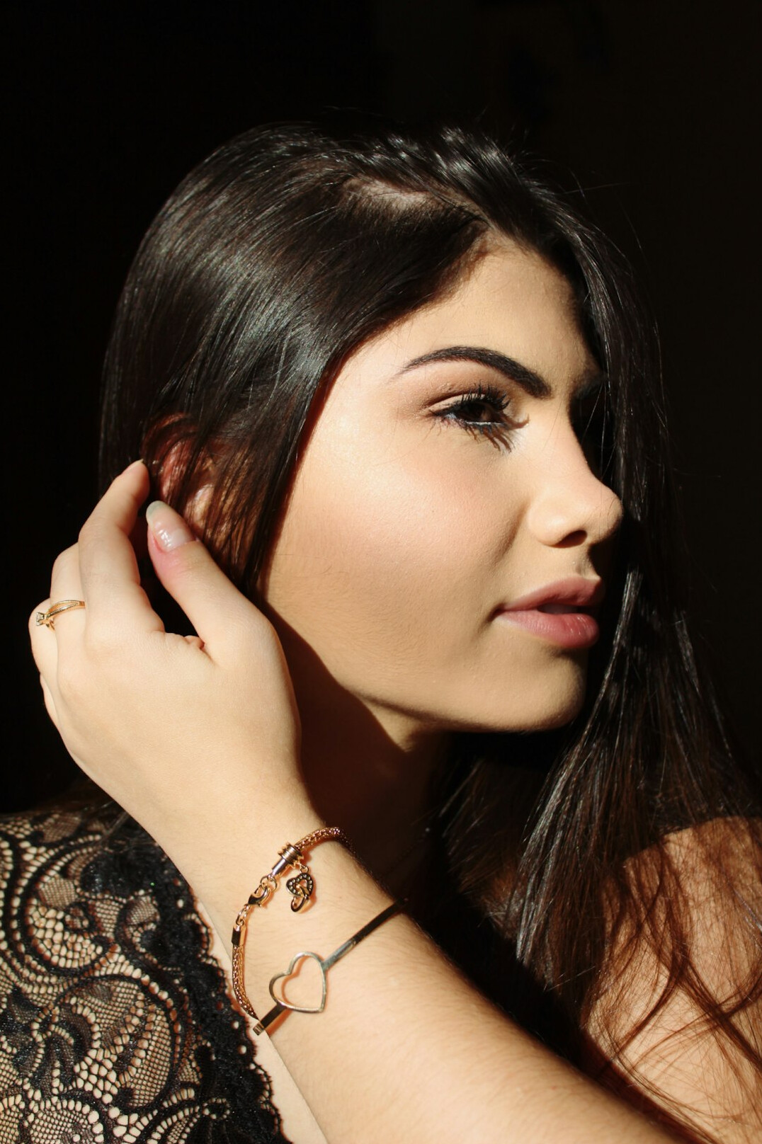 Studio portrait of a young Brazilian woman with straight hair